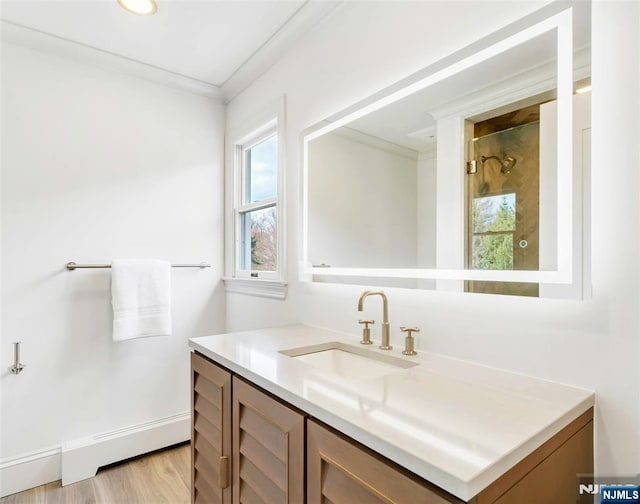 333 Mill Rd, Saddle River, NJ 07458 - full bath featuring vanity, wood finished floors, a baseboard radiator, and a shower