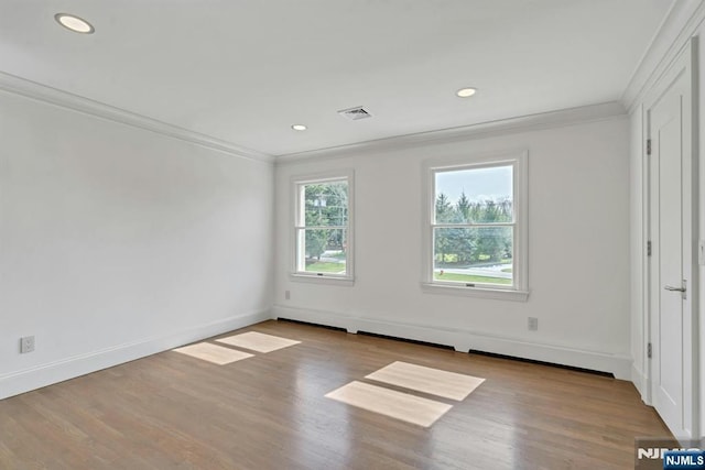 333 Mill Rd, Saddle River, NJ 07458 - unfurnished bedroom featuring ornamental molding, wood finished floors, and recessed lighting