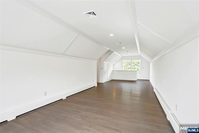 333 Mill Rd, Saddle River, NJ 07458 - bonus room with lofted ceiling, baseboard heating, and wood finished floors