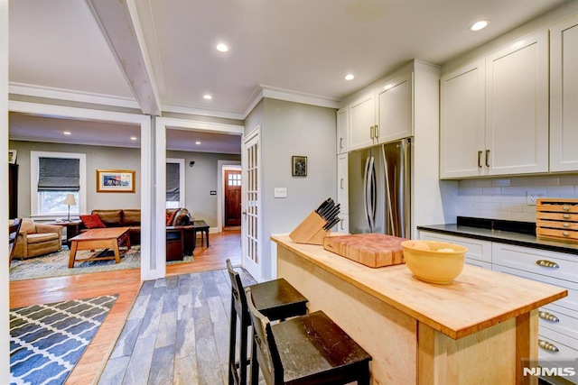 123 Buena Vista Ave, Hawthorne, NJ 07506 - kitchen with wooden counters, freestanding refrigerator, crown molding, light wood finished floors, and recessed lighting