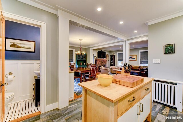 123 Buena Vista Ave, Hawthorne, NJ 07506 - kitchen featuring butcher block countertops, radiator heating unit, ornamental molding, a chandelier, and recessed lighting