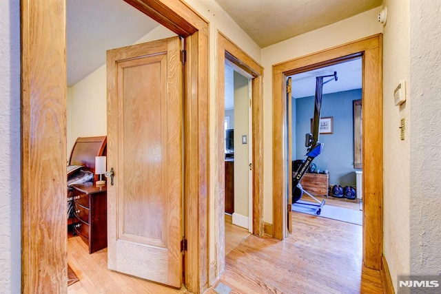 123 Buena Vista Ave, Hawthorne, NJ 07506 - corridor with light wood-style flooring and a textured wall