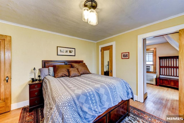 123 Buena Vista Ave, Hawthorne, NJ 07506 - bedroom featuring wood-type flooring and ornamental molding