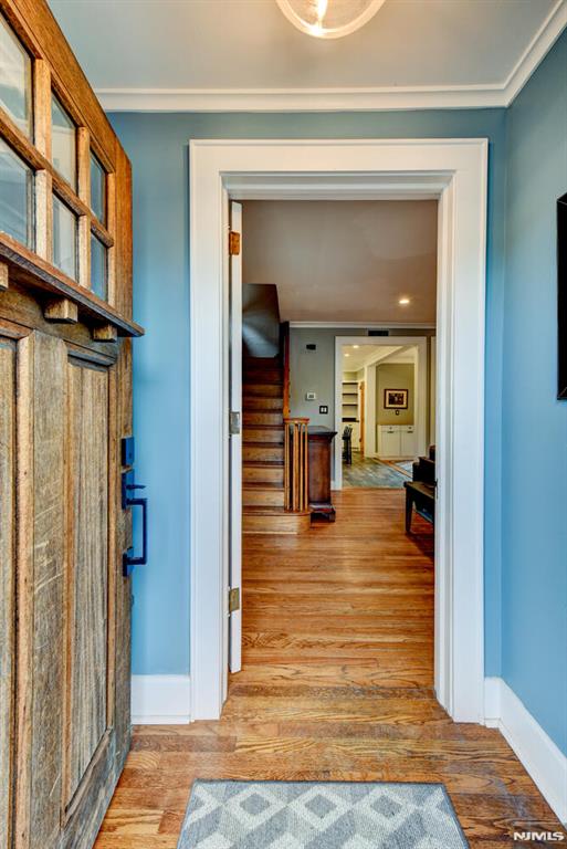 123 Buena Vista Ave, Hawthorne, NJ 07506 - hall with crown molding and wood finished floors