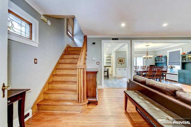 123 Buena Vista Ave, Hawthorne, NJ 07506 - staircase featuring radiator, wood finished floors, plenty of natural light, crown molding, and recessed lighting