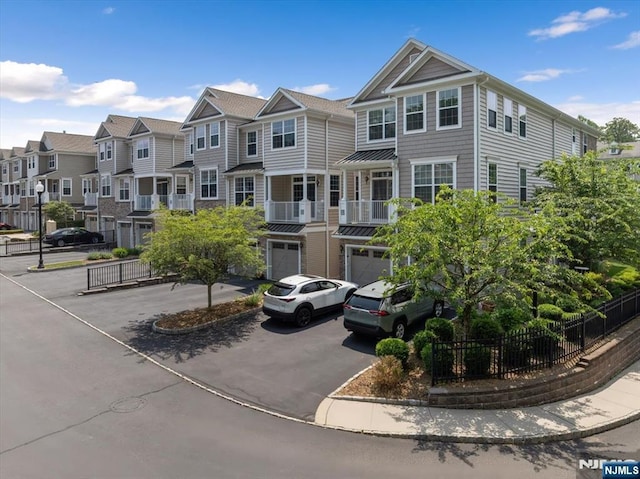 73 Autumn Way Unit 24, Montvale, NJ 07645 - view of property featuring driveway, a garage, and a residential view