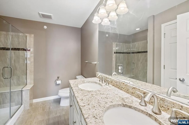 73 Autumn Way Unit 24, Montvale, NJ 07645 - bathroom featuring double vanity, a stall shower, a chandelier, and tile patterned floors