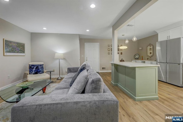 669 Juniper Way, Mahwah, NJ 07430 - living room featuring light wood finished floors and recessed lighting