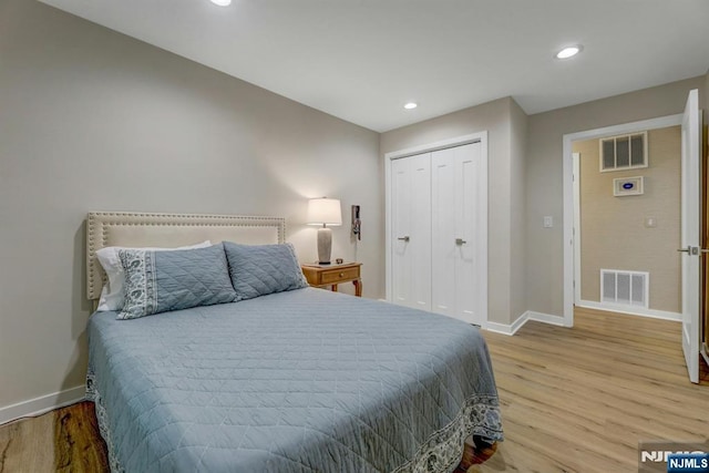 669 Juniper Way, Mahwah, NJ 07430 - bedroom featuring wood finished floors, recessed lighting, and a closet