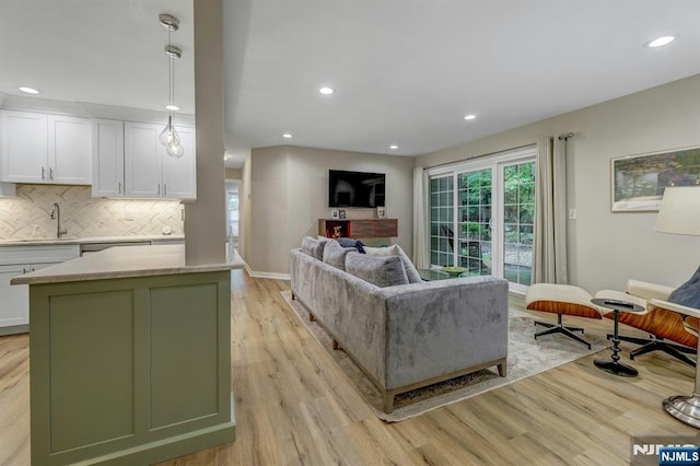 669 Juniper Way, Mahwah, NJ 07430 - living room featuring light wood-style floors, recessed lighting, and plenty of natural light