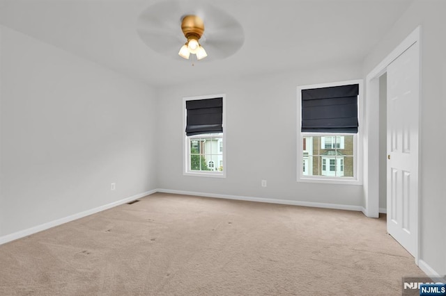 231 Swathmore Dr, Nutley, NJ 07110 - unfurnished room with carpet, plenty of natural light, and ceiling fan