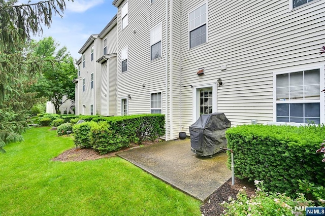 231 Swathmore Dr, Nutley, NJ 07110 - view of grassy yard featuring a patio area