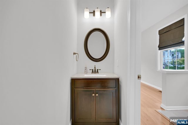 231 Swathmore Dr, Nutley, NJ 07110 - bathroom with vanity and wood finished floors