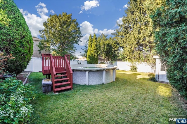 405 Abbott Ave, Ridgefield, NJ 07657 - fenced backyard featuring a deck