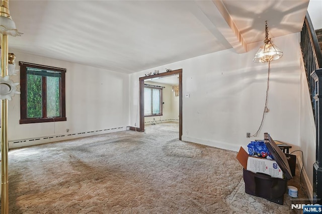 405 Abbott Ave, Ridgefield, NJ 07657 - carpeted empty room with baseboard heating and baseboards