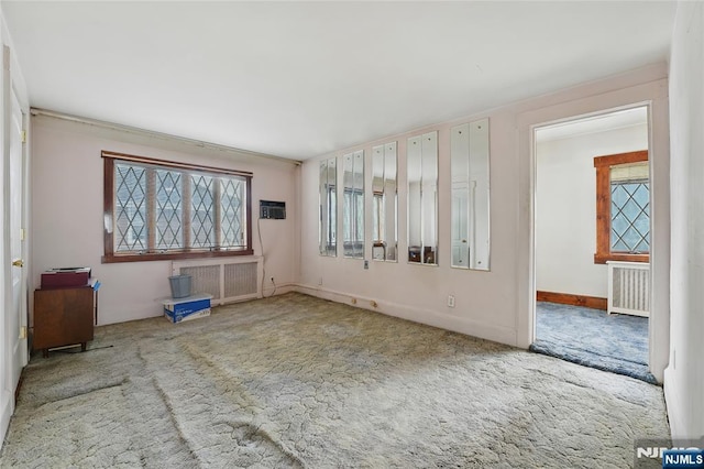 405 Abbott Ave, Ridgefield, NJ 07657 - carpeted empty room featuring radiator and baseboards