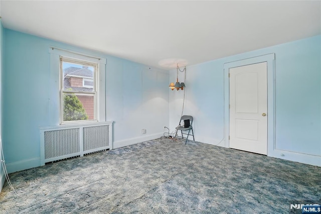 405 Abbott Ave, Ridgefield, NJ 07657 - carpeted empty room featuring radiator and baseboards