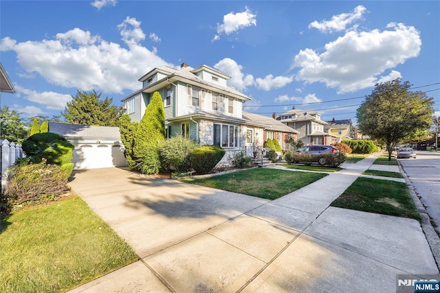 405 Abbott Ave, Ridgefield, NJ 07657 - american foursquare style home with a garage, driveway, a front yard, and stone siding