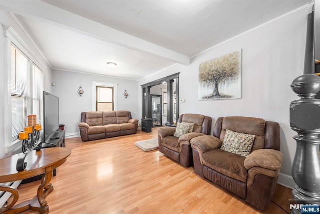 178-180 17th Ave, Paterson, NJ 07504 - living area featuring light wood finished floors and crown molding