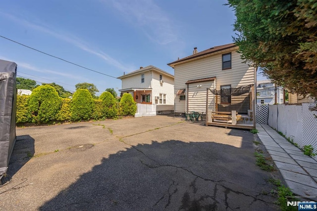 178-180 17th Ave, Paterson, NJ 07504 - back of house with a wooden deck