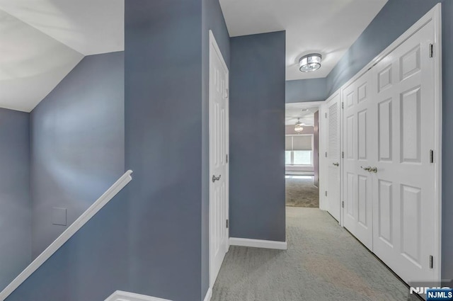 178 Arthur St, Hillsdale, NJ 07642 - hall with an upstairs landing, carpet flooring, and vaulted ceiling