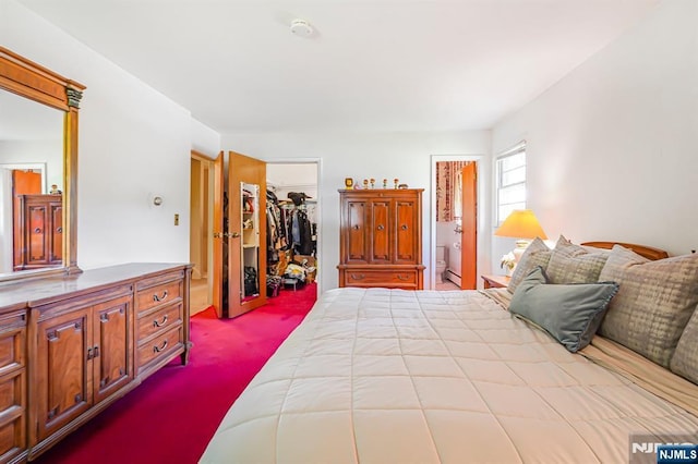 24 Eton Ct, Wayne, NJ 07470 - carpeted bedroom with a closet, a spacious closet, and connected bathroom