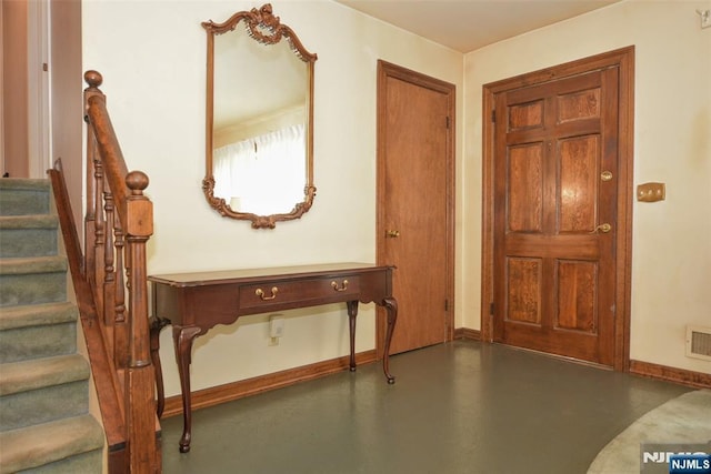 29 Lotus Ln, Waldwick, NJ 07463 - entryway with finished concrete floors and stairs