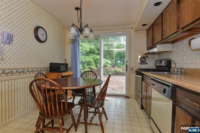29 Lotus Ln, Waldwick, NJ 07463 - dining room featuring wallpapered walls and light flooring