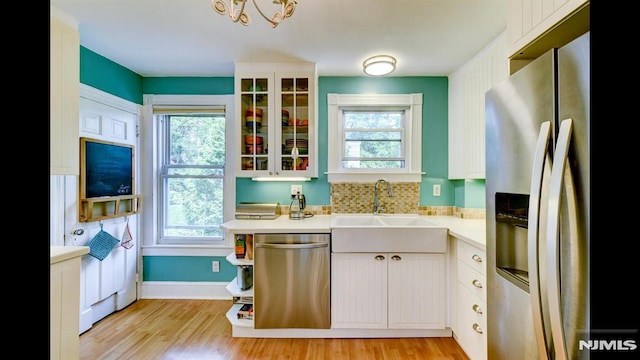 118 High St, Nutley, NJ 07110 - kitchen with appliances with stainless steel finishes, light countertops, and plenty of natural light