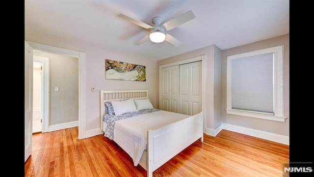 118 High St, Nutley, NJ 07110 - bedroom with a closet, light wood-type flooring, and a ceiling fan
