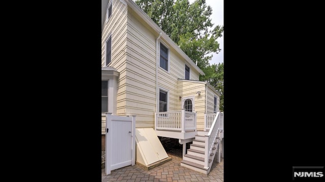118 High St, Nutley, NJ 07110 - back of house with a wooden deck and stairs