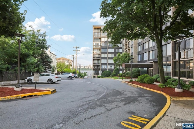 9060 Palisade Ave Unit 511, North Bergen, NJ 07047 - view of street with street lighting and curbs