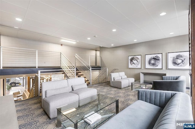 9060 Palisade Ave Unit 511, North Bergen, NJ 07047 - living area with stairway, carpet flooring, a drop ceiling, and recessed lighting