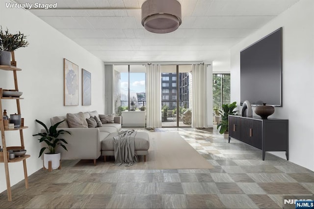 9060 Palisade Ave Unit 511, North Bergen, NJ 07047 - living room with expansive windows