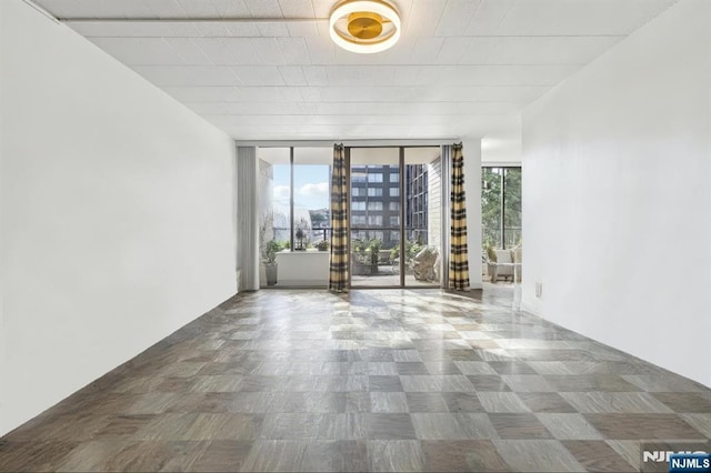 9060 Palisade Ave Unit 511, North Bergen, NJ 07047 - empty room with floor to ceiling windows