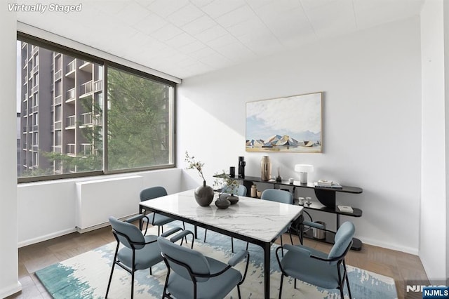 9060 Palisade Ave Unit 511, North Bergen, NJ 07047 - dining room featuring baseboards