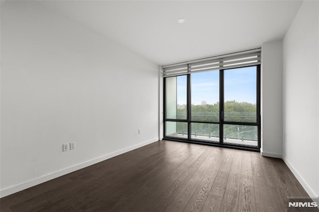 320 Adolphus Ave Unit 604, Cliffside Park, NJ 07010 - spare room featuring floor to ceiling windows and dark wood finished floors
