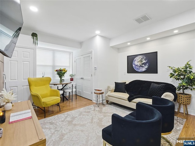 1050 Bond St, Elizabeth, NJ 07201 - living area with wood finished floors and recessed lighting