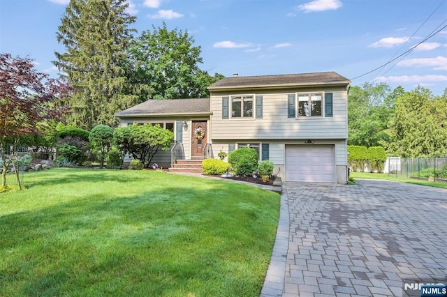 16 Murray Rd, Montvale, NJ 07645 - split level home with an attached garage and decorative driveway
