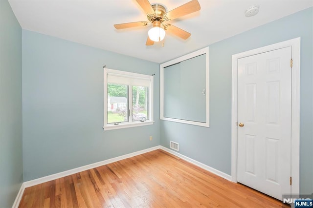 16 Murray Rd, Montvale, NJ 07645 - spare room with light wood finished floors, a smoke detector, and a ceiling fan