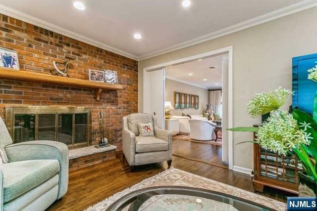 74 O Shaughnessy Ln, Closter, NJ 07624 - living room featuring wood finished floors, a fireplace, crown molding, and recessed lighting
