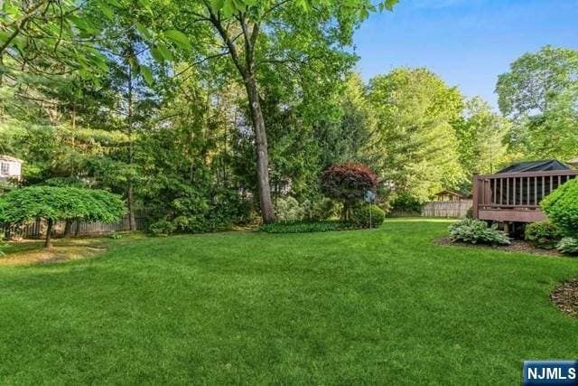 74 O Shaughnessy Ln, Closter, NJ 07624 - view of yard with a wooden deck