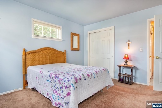 744 9th St, Carlstadt, NJ 07072 - carpeted bedroom featuring a closet and baseboards