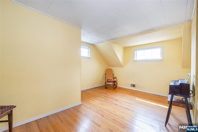 744 9th St, Carlstadt, NJ 07072 - additional living space featuring wood finished floors