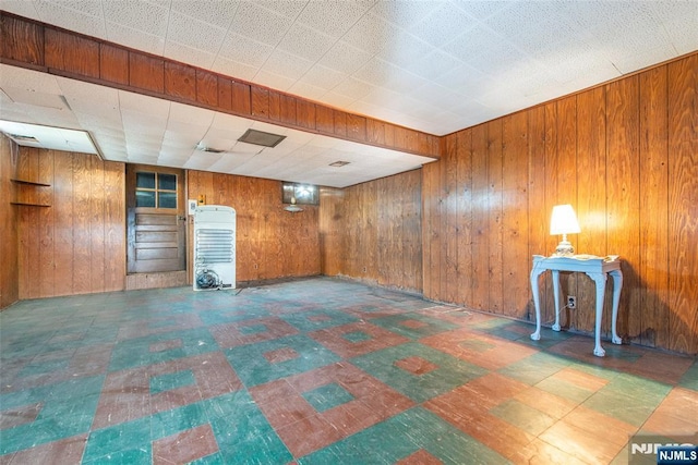 744 9th St, Carlstadt, NJ 07072 - finished below grade area with tile patterned floors and wooden walls