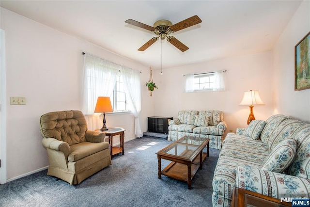 744 9th St, Carlstadt, NJ 07072 - living area featuring carpet and a ceiling fan
