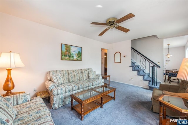 744 9th St, Carlstadt, NJ 07072 - carpeted living room with stairway and a ceiling fan