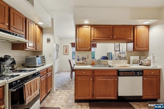 1907 Faulkner Ct, Mahwah, NJ 07430 - kitchen featuring white dishwasher, range with gas cooktop, under cabinet range hood, light countertops, and recessed lighting