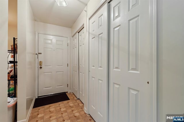 1907 Faulkner Ct, Mahwah, NJ 07430 - doorway to outside with light floors and baseboards