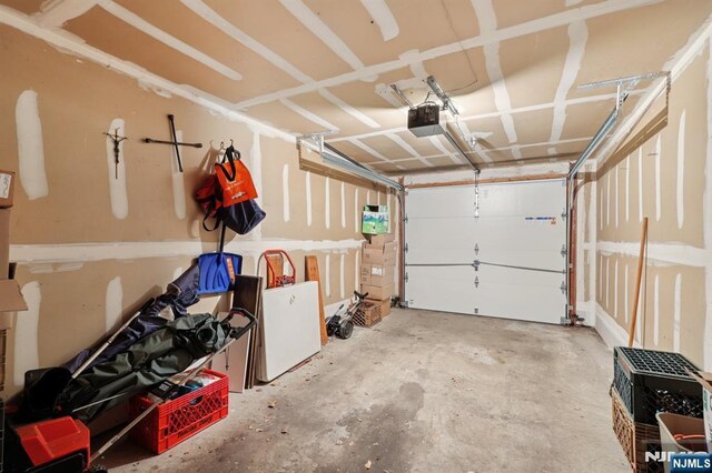 1907 Faulkner Ct, Mahwah, NJ 07430 - garage featuring a garage door opener